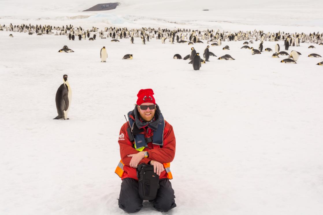 A photograph of James Cresswell at the Snow Hill Emperor Penguin colony in Antarctica
