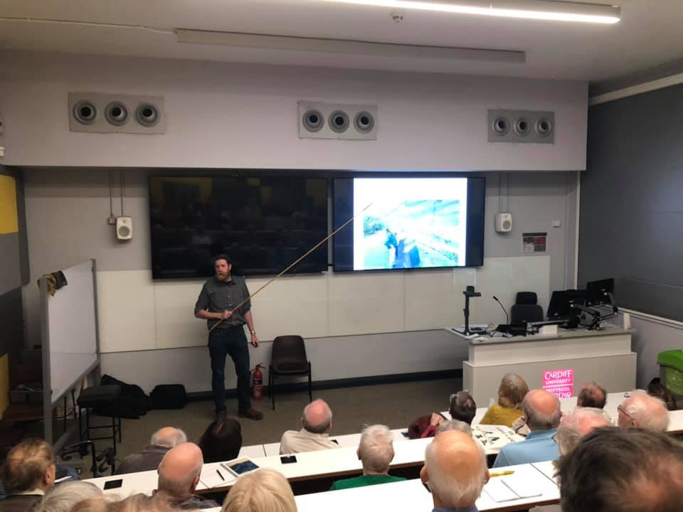 A photograph of James Cresswell giving a geology talk to the South Wales Geologists Association